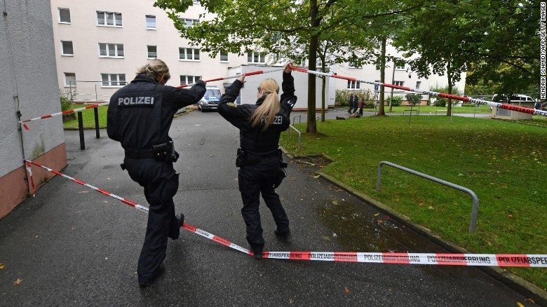 Police secure a residential area in Chemnitz, Germany, after explosives were found in an apartment