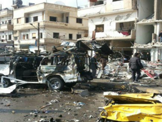 Syria: Military top chief among dozens killed in suicide attacks in Homs