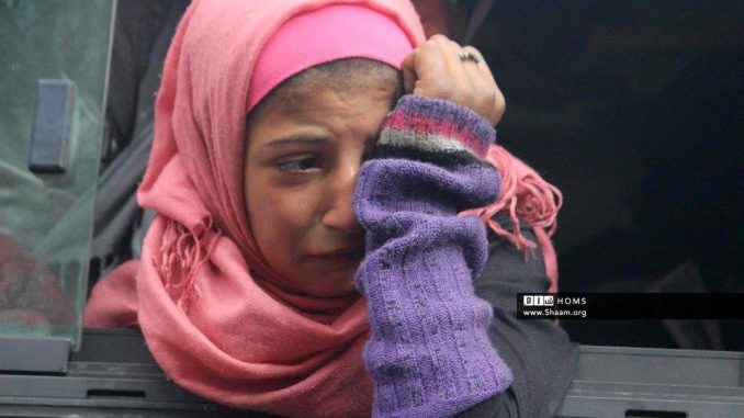 Farewell: Civilians displaced from Homs' last Rebel-held district